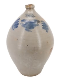 BLUE DECORATED OVOID ADVERTISING JUG