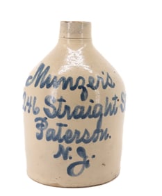 STONEWARE SCRIPT ADVERTISING JUG, PATERSON, NJ