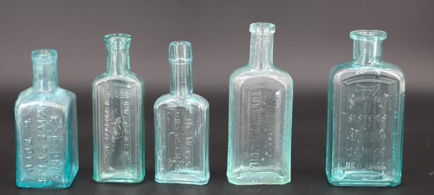 ANTIQUE ADVERTISING BOTTLES
