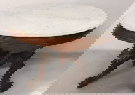 VICTORIAN MARBLE TOP TABLE: MARBLE TOP, FANCY EASTLAKE STYLE, COFFEE TABLE HEIGHT - 22" X 34 1/2" X 25" PLEASE READ CAREFULLY - Terms for Purchasing and Shipping of Auction Items. Please read carefully before bidding. All paymen