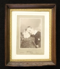 FRAMED PHOTOGRAPH OF CHILD WITH CAT