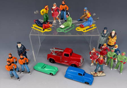 LOT OF VINTAGE TOYS: PAINTED ICE SKATERS, SLEDDERS AND SKIERS. WITH, TOOTSIE TOY CARS AND TOW TRUCK 4 1/2" H. PLEASE READ CAREFULLY - Terms for Purchasing and Shipping of Auction Items. Please read carefully before biddin