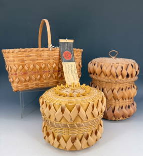 LOT OF NATIVE AMERICAN TOURIST BASKETS: FOUR BASKETS WITH WOVEN DESIGNS. ONE WITH ORIGINAL TAG "INDIAN ARTS AND CRAFTS BOARD" TALLEST 8 1/2" H. PLEASE READ CAREFULLY - Terms for Purchasing and Shipping of Auction Items. Please read carefull