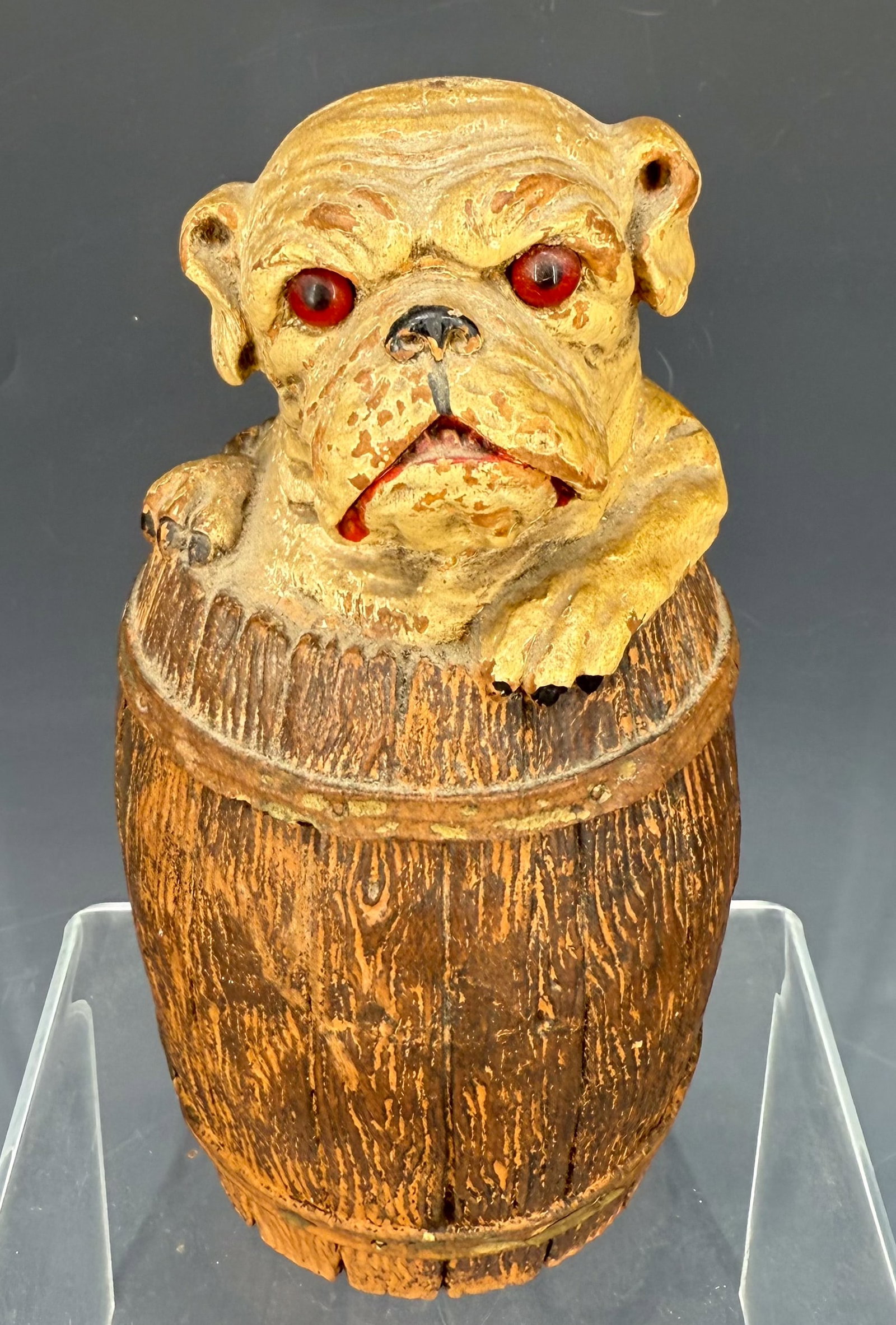 BULLDOG IN BARREL CIGARETTE DISPENSER: LIFT-OFF LID. DIVIDED COMPARTMENT INTERIOR. 7" H. PLEASE READ CAREFULLY - Terms for Purchasing and Shipping of Auction Items. Please read carefully before bidding. Hartzell’s Auction Gallery. Ha