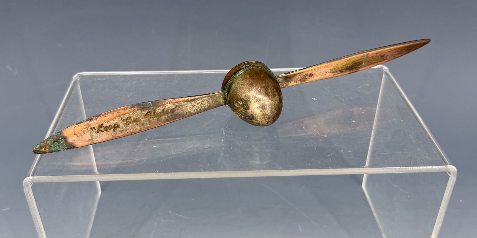 ADVERTISING COPPER LETTER OPENER: PROPELLER "KEEP EM FLYING", DOW & COMPANY. MRKD. ST. PAUL AND PAT'D. ON BACK. 8 3/4" L. PLEASE READ CAREFULLY - Terms for Purchasing and Shipping of Auction Items. Please read carefully before bidding