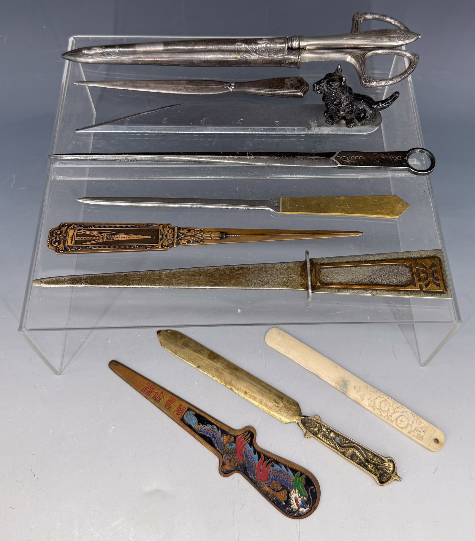 LOT OF VINTAGE LETTER OPENERS: VARIETY OF (10) LETTER OPENERS. LARGEST 10" L. (HAS HALLMARKS). RULER/OPENER WITH DOG MRKD. "HERSHEY, DERBY, CONN". PLEASE READ CAREFULLY - Terms for Purchasing and Shipping of Auction Items. Please r
