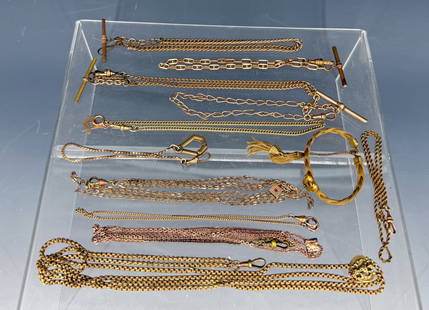 LOT OF GOLD WATCH CHAINS AND MORE: GOLD TONE CHAINS IN VARIETY OF STYLES. ONE WITH MASONS CHARM. "SWEETHEART" MILITARY BRACELET WITH HEART LOCKET. PLEASE READ CAREFULLY - Terms for Purchasing and Shipping of Auction Items. Please read