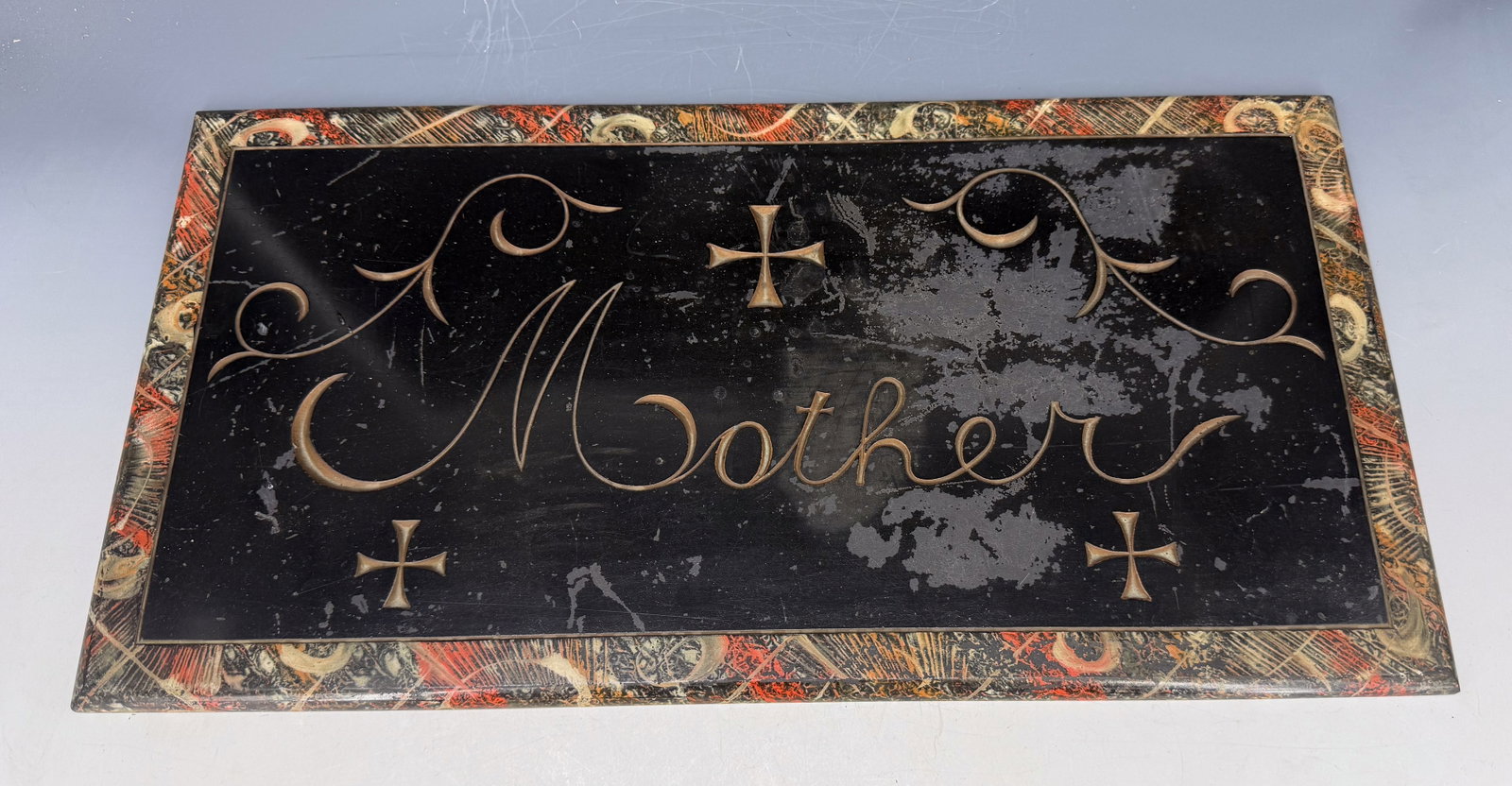 DECORATED SLATE "MOTHER" PLAQUE: MARBLEIZED BORDER WITH INCISED DECORATION. 11" X 21 1/2". PLEASE READ CAREFULLY - Terms for Purchasing and Shipping of Auction Items. Please read carefully before bidding. Hartzell’s Auction Gal
