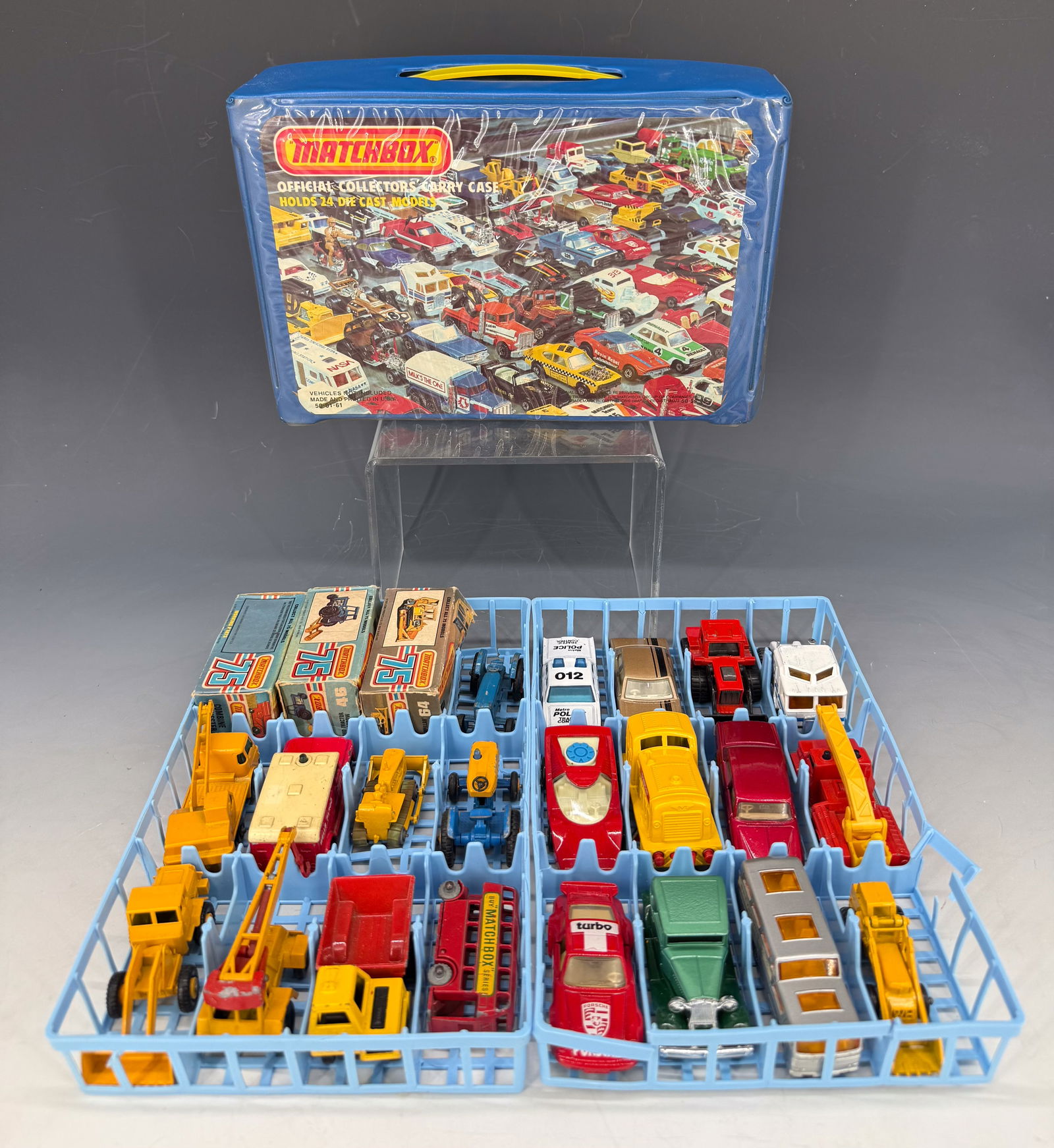 LOT OF MATCHBOX BY LESNEY TOY CARS/TRUCKS: (24) WITH THREE IN ORIGINAL BOXES. CONTAINED IN MATCHBOX CASE 10" L. PLEASE READ CAREFULLY - Terms for Purchasing and Shipping of Auction Items. Please read carefully before bidding. Hartzell’s