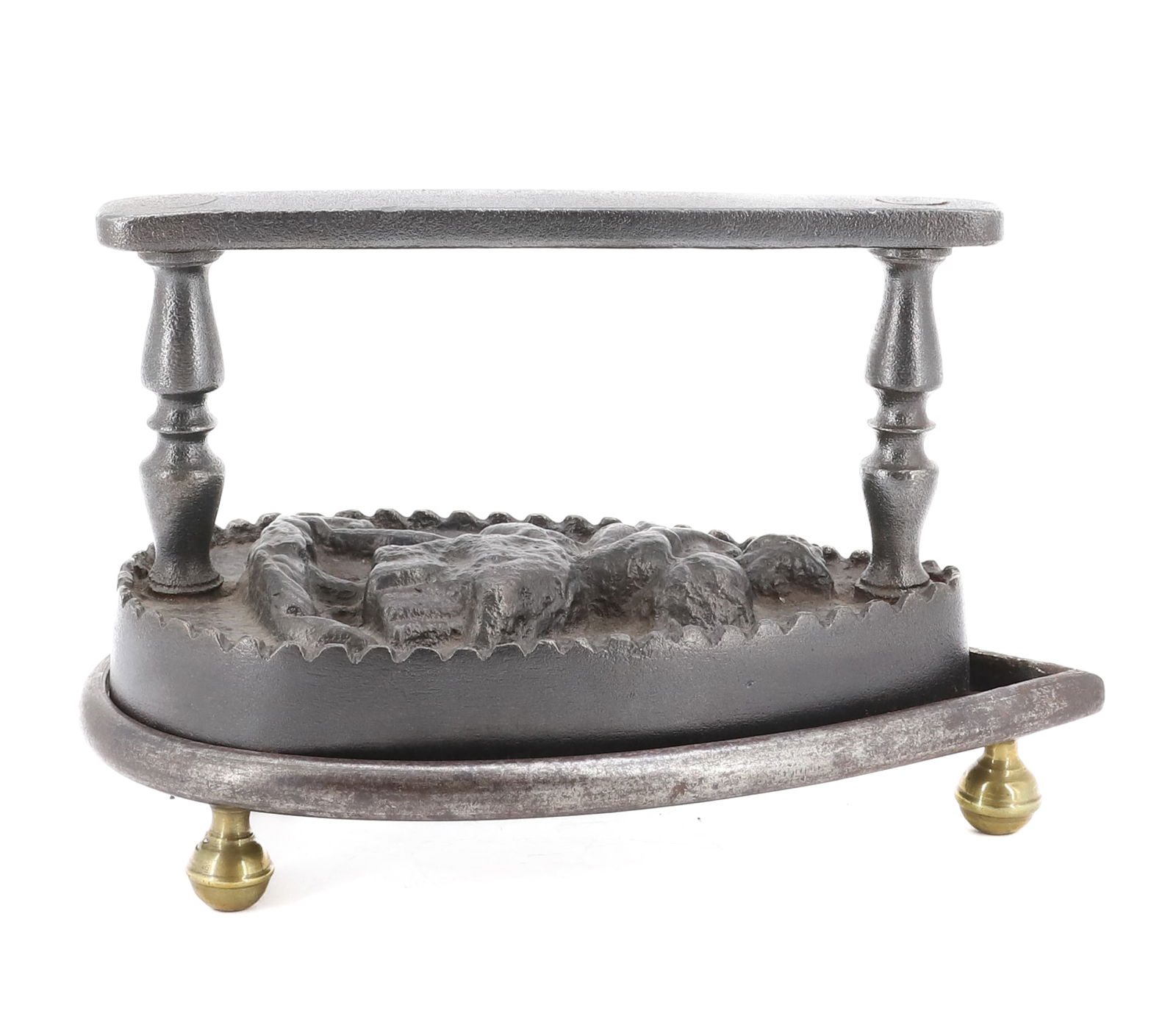 FANCY FRENCH FLAT IRON: HEAVILY EMBOSSED "LOVING COUPLE" WITH TRIVET. ROUND BRASS FEET. 8 3/4" L. PLEASE READ CAREFULLY - Terms for Purchasing and Shipping of Auction Items. Please read carefully before bidding. THIS IS AN O