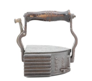 19TH CENTURY REVOLVING IRON