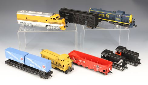 LOT OF LOCOMOTIVES AND TRAIN CARS