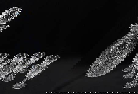 WATERFORD CRYSTAL DECANTER AND STEMWARE: MAEVE PATTERN. DECANTER 10 3/8" H. WITH (8) STEMMED CORDIALS 2 7/8" H. PLEASE READ CAREFULLY - Terms for Purchasing and Shipping of Auction Items. Please read carefully before bidding. Hartzell’