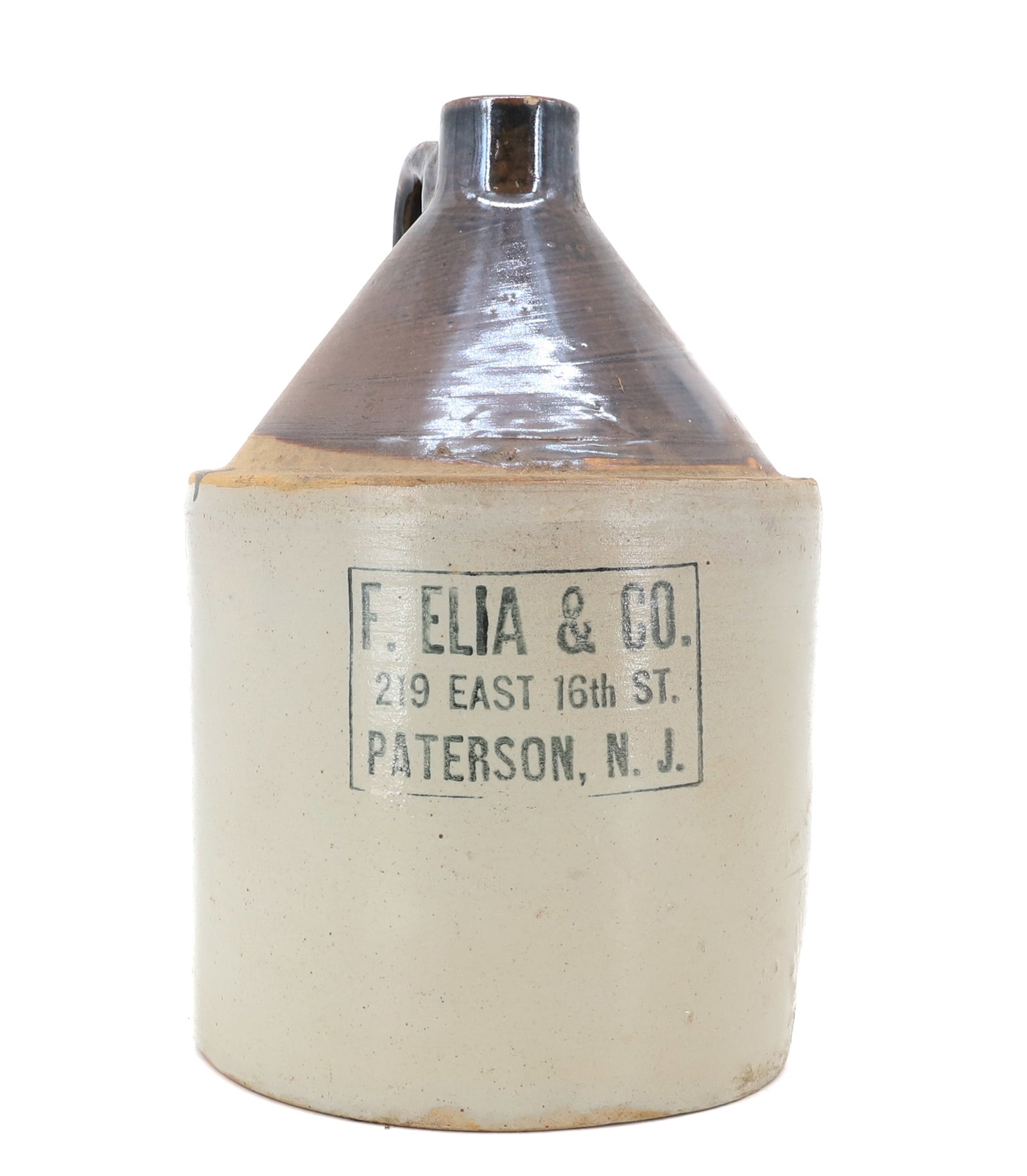 F. ELIA & CO. STONEWARE ADVERTISING JUG: 219 EAST 16TH ST. PATERSON, N.J. 11" H. PLEASE READ CAREFULLY - Terms for Purchasing and Shipping of Auction Items. Please read carefully before bidding. Hartzell’s Auction Gallery. Hartzell's A