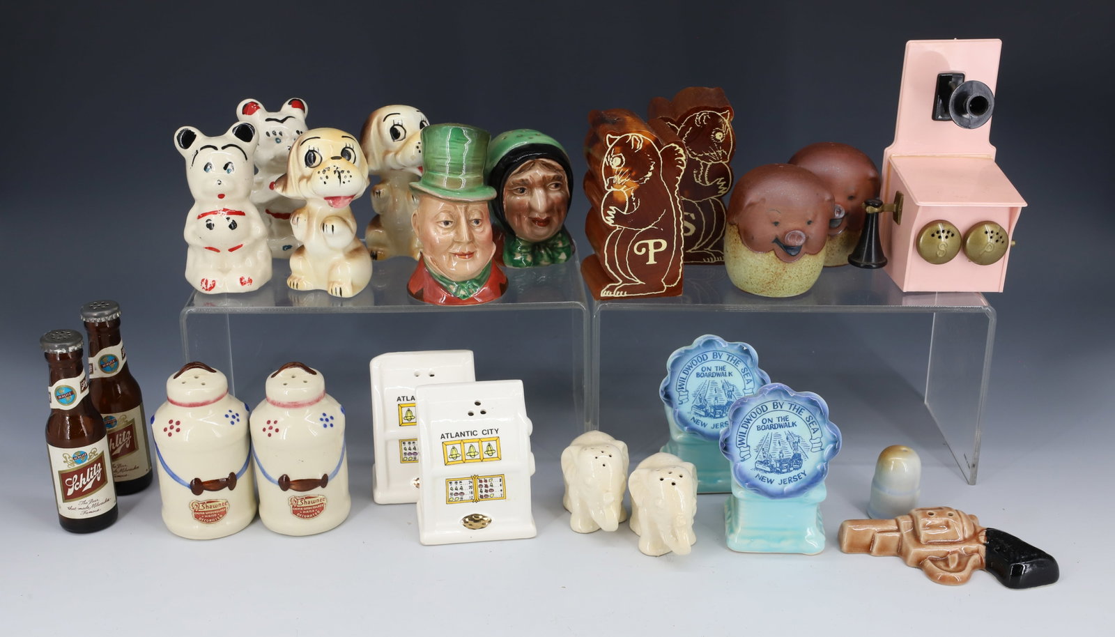 LOT OF VINTAGE SALT AND PEPPER SHAKERS: 12 SETS INCLUDING: GUN/BULLET, SQUIRRELS, SLOT MACHINES, SOUVENIR AND MORE. PLEASE READ CAREFULLY - Terms for Purchasing and Shipping of Auction Items. Please read carefully before bidding. Hartzell&#