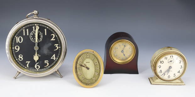 LOT OF VINTAGE ALARM CLOCKS, TIFFANY & CO.: OVAL TIFFANY & CO. 8-DAY CLOCK 3" H. (NOT RUNNING). TWO WESTCLOX (BIG BEN AND BABY BEN) AND LUX CLOCK IN AMBER CASE (GERMANY). PLEASE READ CAREFULLY - Terms for Purchasing and Shipping of Auction Item
