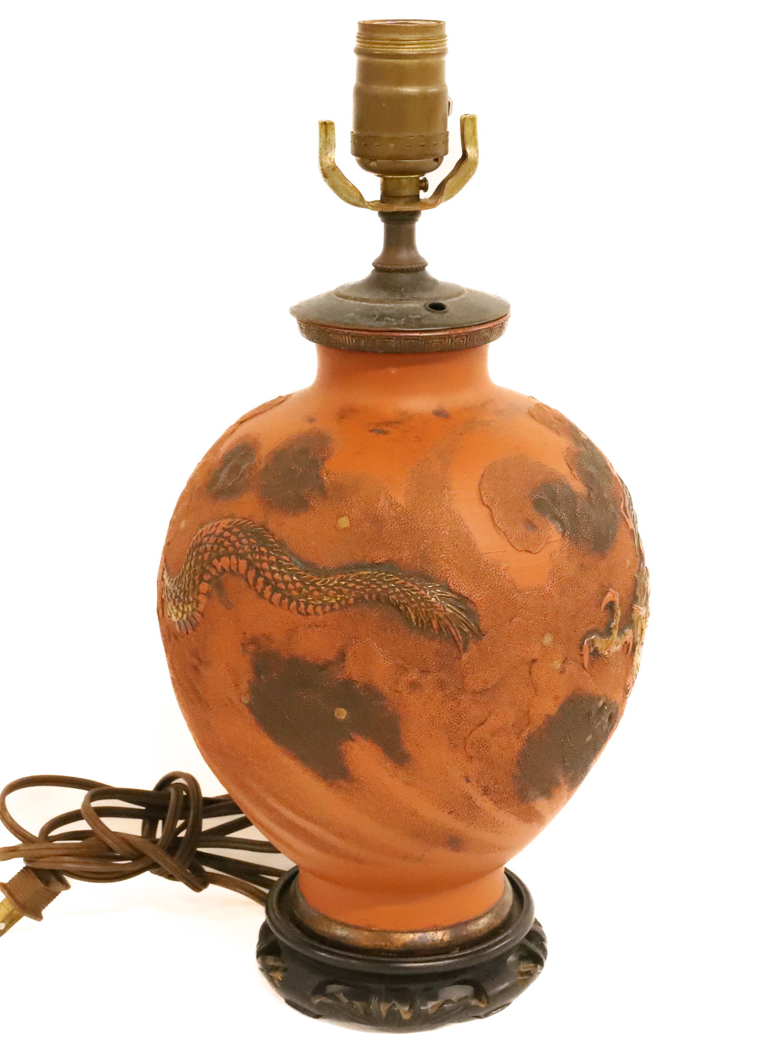 JAPANESE TOKONAME POTTERY LAMP: DRAGON MOTIF IN RELIEF ON RED CLAY BODY. BASE HEIGHT 10 1/4". PLEASE READ CAREFULLY - Terms for Purchasing and Shipping of Auction Items. Please read carefully before bidding. Hartzell’s Auction
