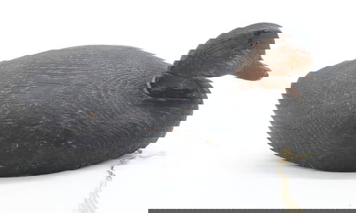 WOODEN DUCK DECOY: CARVED AND PAINTED WITH GLASS EYES. LEAD WEIGHT. 15 1/4" L. PLEASE READ CAREFULLY - Terms for Purchasing and Shipping of Auction Items. Please read carefully before bidding. Hartzell&#8217;s Auction G