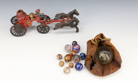 LOT OF MARBLES AND CAST IRON FIRE PUMPER