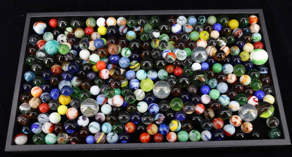 LARGE LOT OF GLASS MARBLES: VARIOUS SIZES AND COLORS OF SWIRLED MARBLES. LARGEST 3/4" D. PLEASE READ CAREFULLY - Terms for Purchasing and Shipping of Auction Items. Please read carefully before bidding. Hartzell&#8217;s Auction