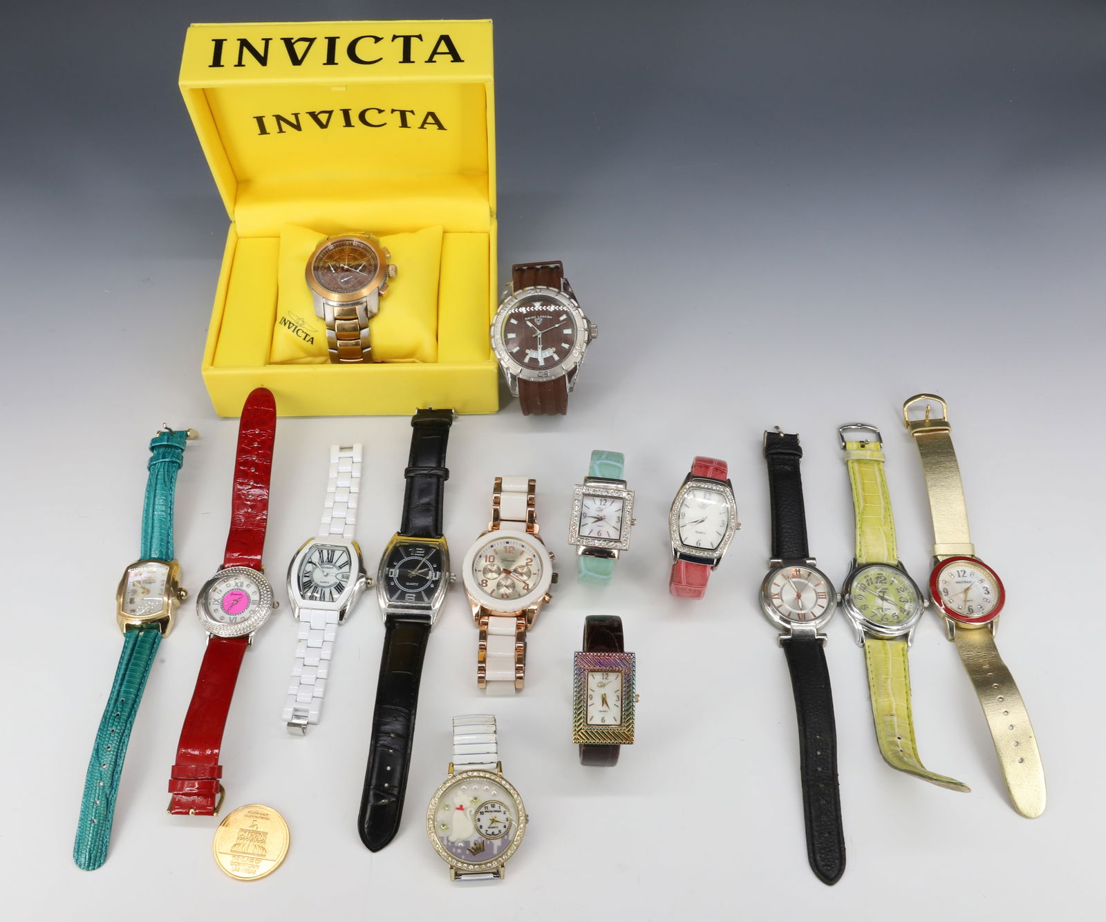 LOT OF DESIGNER WATCHES: INCLUDING: INVICTA, WALTHAM, GENEVA, GOSSIP, SWISS LEGEND AND MORE. PLEASE READ CAREFULLY - Terms for Purchasing and Shipping of Auction Items. Please read carefully before bidding. Hartzell’s A