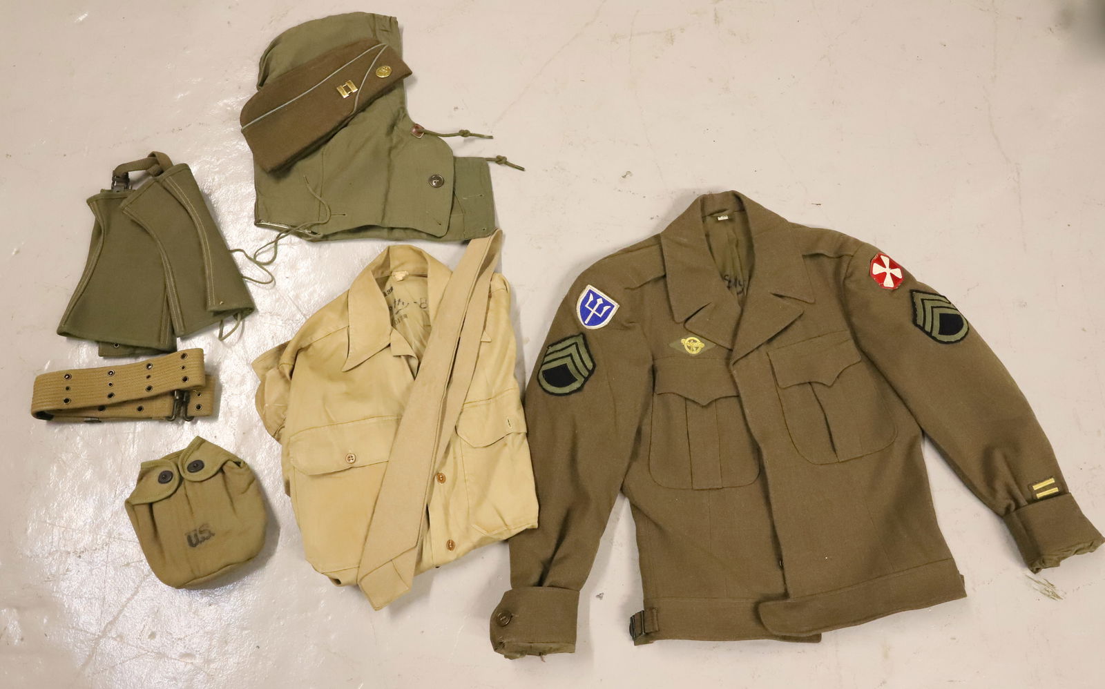 LOT OF MILITARY UNIFORMS: WOOL JACKET WITH PATCHES, SHIRT, TIE, HAT AND MORE. PLEASE READ CAREFULLY - Terms for Purchasing and Shipping of Auction Items. Please read carefully before bidding. Hartzell’s Auction Gallery.