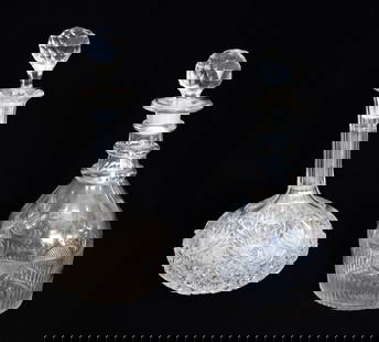 (2) ANTIQUE GLASS DECANTERS: CUT GLASS AND BLOWN GLASS (SMOOTH PONTIL), BOTH WITH FACETED STOPPERS. 10 1/4" AND 11" HEIGHTS. PLEASE READ CAREFULLY - Terms for Purchasing and Shipping of Auction Items. Please read carefully before