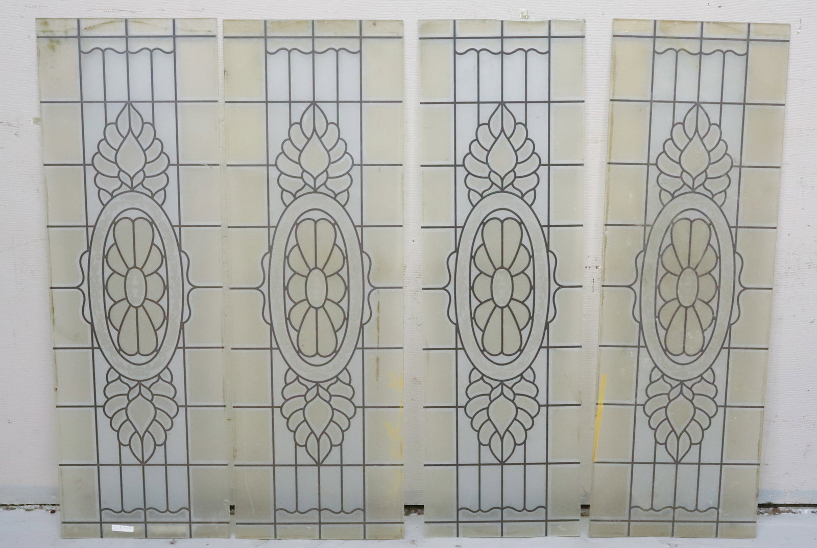 (4) ETCHED GLASS PANELS: BROWN/FROSTED WITH FLORAL MOTIF. 41 1/2" X 13 3/4". ONE 41 1/2" X 12 3/4". PLEASE READ CAREFULLY - Terms for Purchasing and Shipping of Auction Items. Please read carefully before bidding. Hartzell