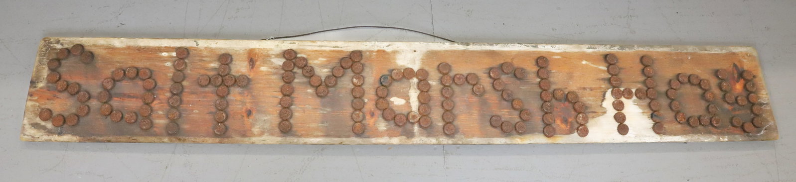 WOODEN BOTTLE CAP TRADE SIGN: SALT MARSH HAY SPELLED OUT WITH BOTTLE CAPS ON WOODEN BACKING. 10" X 72". PLEASE READ CAREFULLY - Terms for Purchasing and Shipping of Auction Items. Please read carefully before bidding. HartzellR