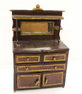 TRAMP ART SIDEBOARD: CHIP CARVED WITH GOLD PAINTED HIGHLIGHTS. MIRRORED BACK OVER THREE DRAWERS OVER TWO DOORS. 14 1/4" X 9 1/4" X 4 3/4". PLEASE READ CAREFULLY - Terms for Purchasing and Shipping of Auction Items. Please