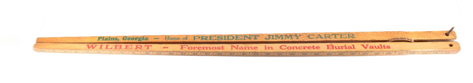 (2) ADVERTISING YARDSTICKS: FOUR-SIDED. "WILBERT BURIAL VAULTS" AND "PLAINS, GEORGIA, HOME OF PRESIDENT JIMMY CARTER". 36" L. PLEASE READ CAREFULLY - Terms for Purchasing and Shipping of Auction Items. Please read carefully befo
