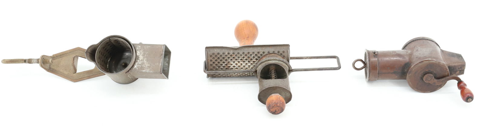 LOT OF NUTMEG GRATERS: (3) ANTIQUE TIN / COPPER GRATERS. ONE MRKD. MTE & CO. LARGEST 5 1/4" L. PLEASE READ CAREFULLY - Terms for Purchasing and Shipping of Auction Items. Please read carefully before bidding. Hartzell’