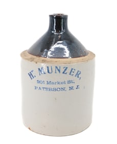 H. MUNZER STONEWARE ADVERTISING JUG