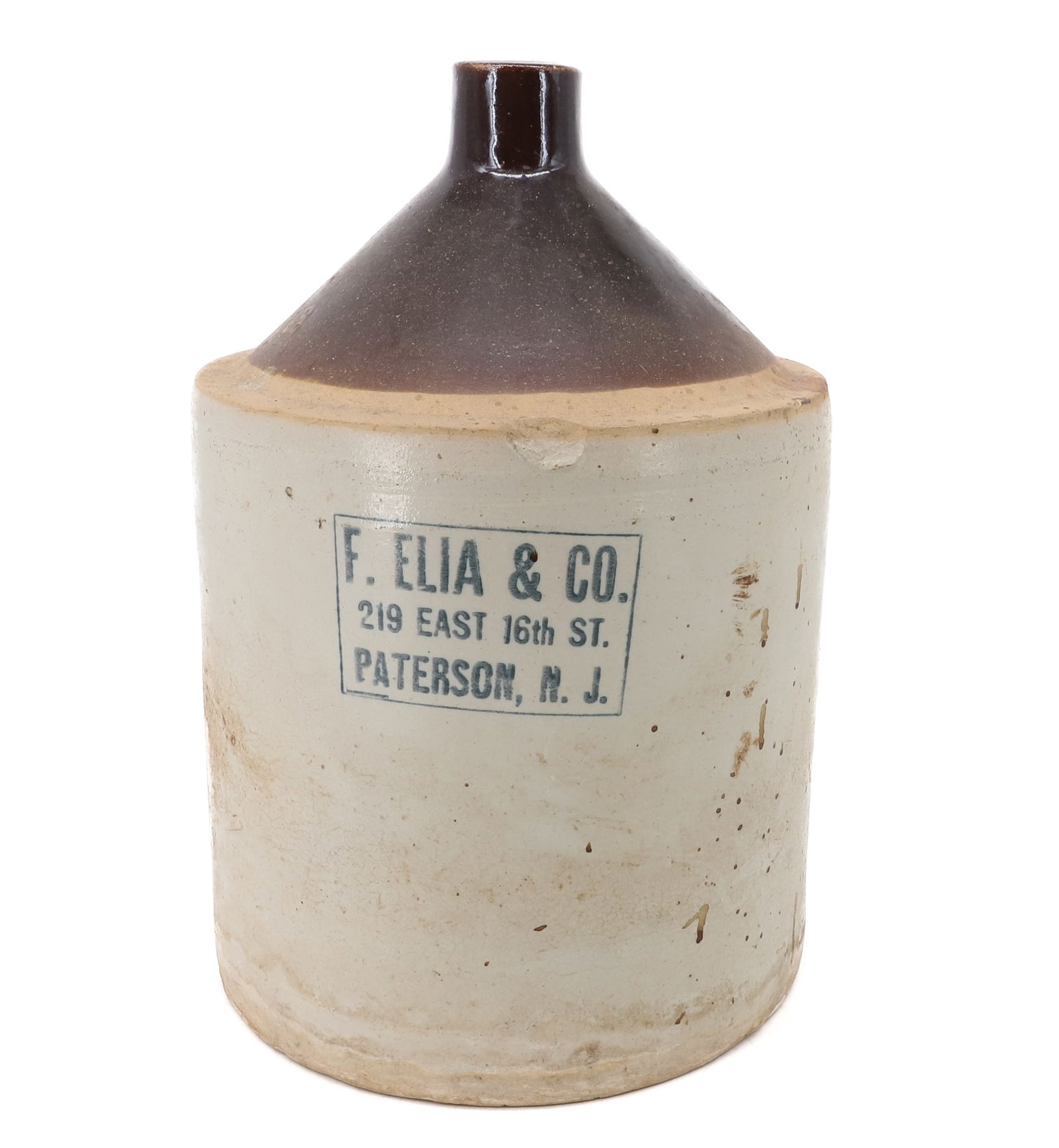 F. ELIA & CO. STONEWARE ADVERTISING JUG: 219 EAST 16TH ST. PATERSON, N.J. 13" H. PLEASE READ CAREFULLY - Terms for Purchasing and Shipping of Auction Items. Please read carefully before bidding. Hartzell’s Auction Gallery. Hartzell's A