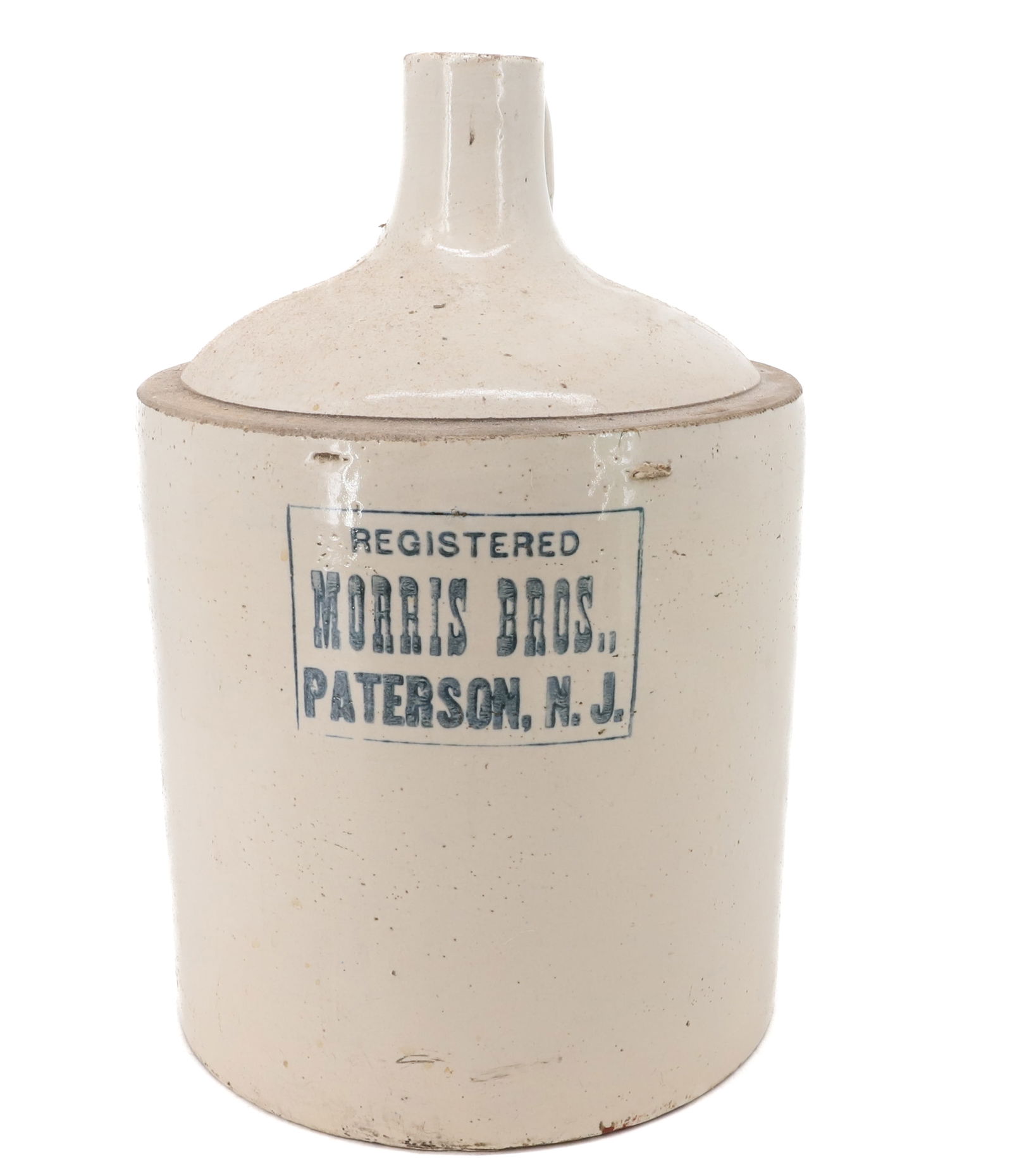 MORRIS BROS. STONEWARE ADVERTISING JUG: REGISTERED, PATERSON, N.J.. 13 3/4" H. PLEASE READ CAREFULLY - Terms for Purchasing and Shipping of Auction Items. Please read carefully before bidding. Hartzell’s Auction Gallery. Hartzell's Au