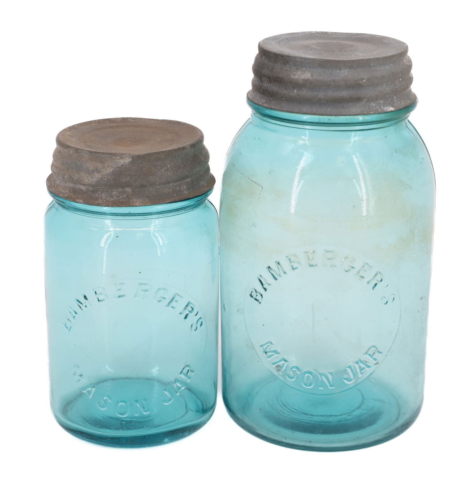 (2) BAMBERGER'S MASON JARS: SMALLER MRKD. "1 F" ON BOTTOM. LARGER MRKD. "3" ON BOTTOM. ZINC LIDS. 5 1/2" AND 7" HEIGHTS. PLEASE READ CAREFULLY - Terms for Purchasing and Shipping of Auction Items. Please read carefully before bi