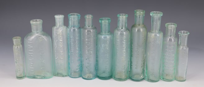 LOT OF (11) AQUA MEDICINE BOTTLES