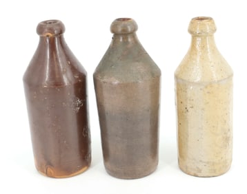 (3) STONEWARE BOTTLES