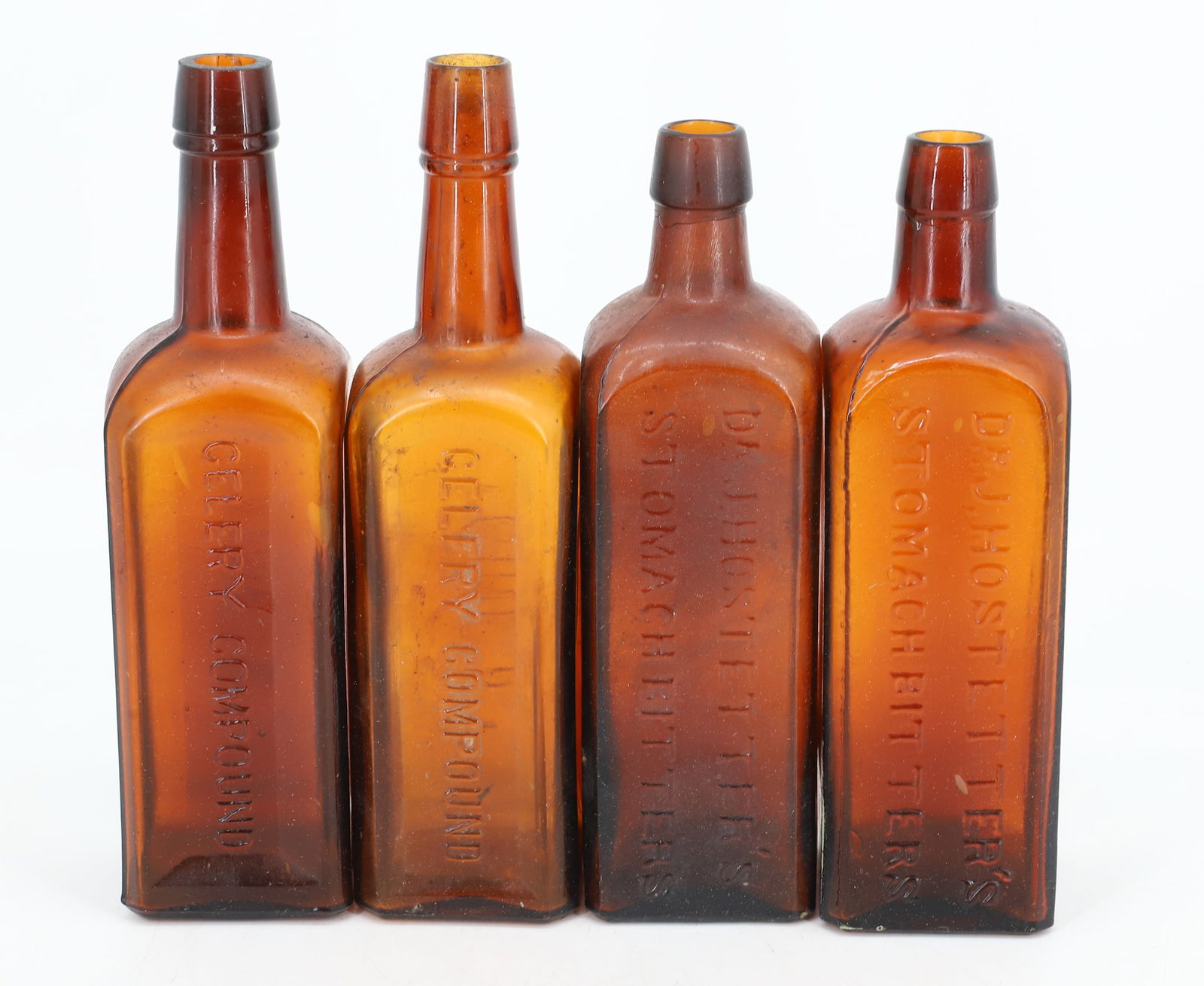 LOT OF (4) AMBER BITTERS BOTTLES (1 of 4)