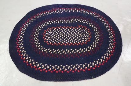 OVAL BRAIDED RUG