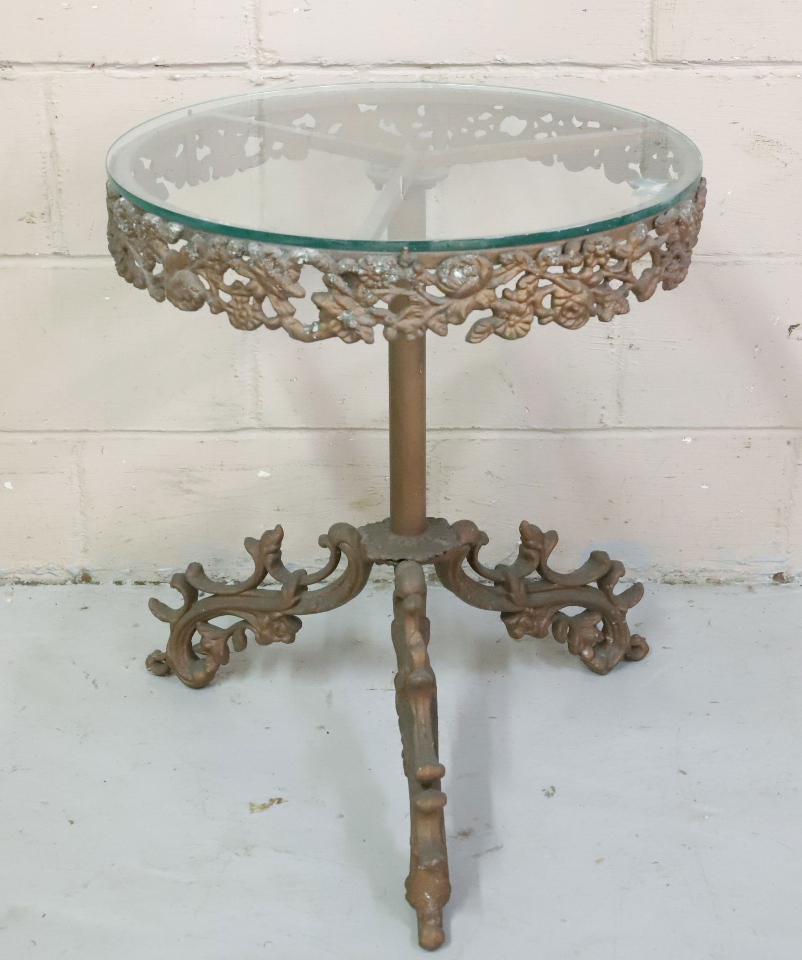 ORNATE CAST IRON TABLE (1 of 3)