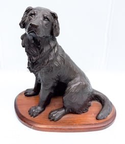 MOLDED DOG SCULPTURE