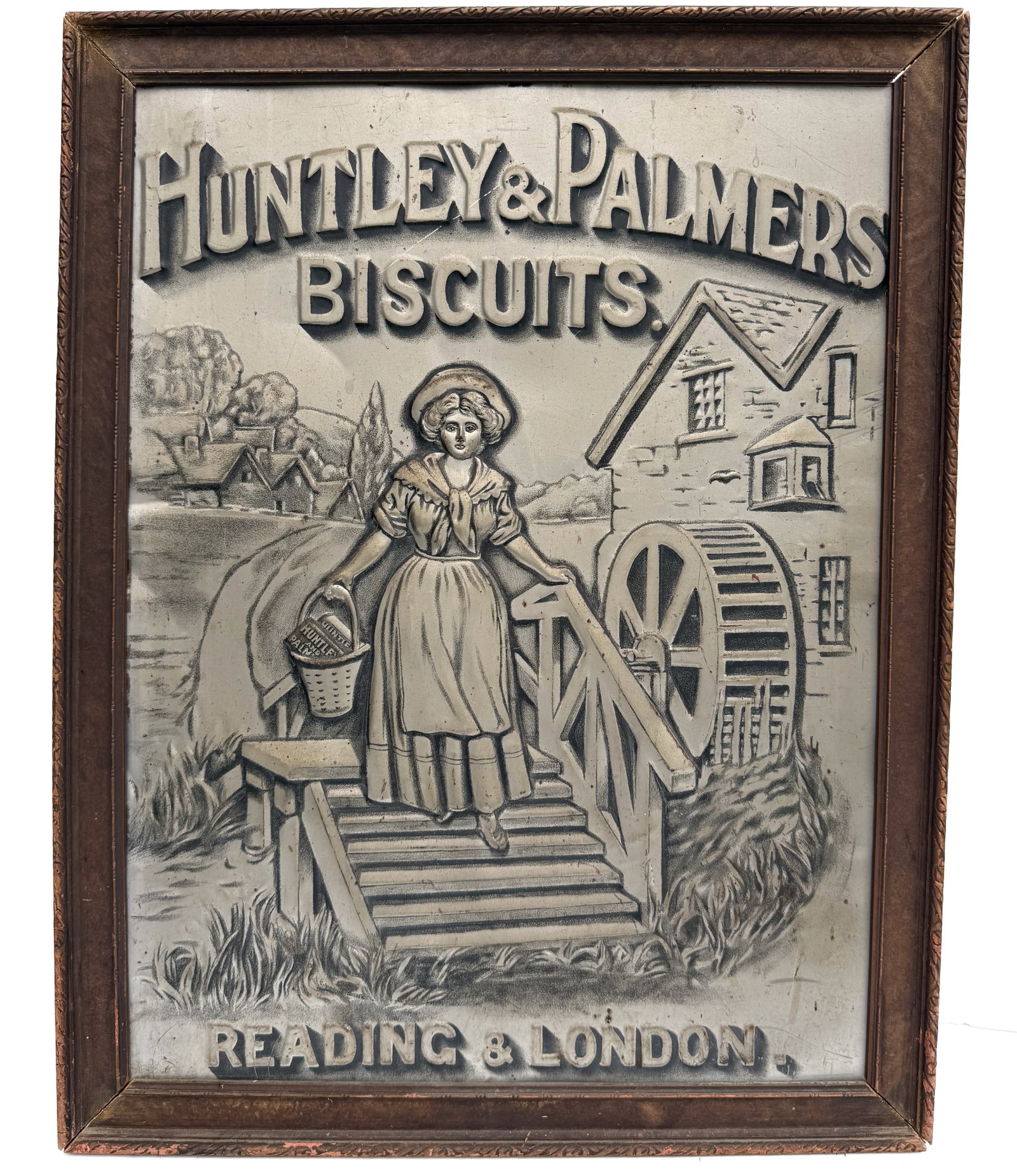 HUNTLEY & PALMERS ADVERTISING SIGN: "BISCUITS, READING & LONDON". PAINTED PRESSED TIN. WOODEN FRAME. TOTAL SIZE 25 3/4" X 20". PLEASE READ CAREFULLY - THIS IS AN ONLINE ONSITE ONLY AUCTION - Terms for Purchasing and Shipping of Auction 