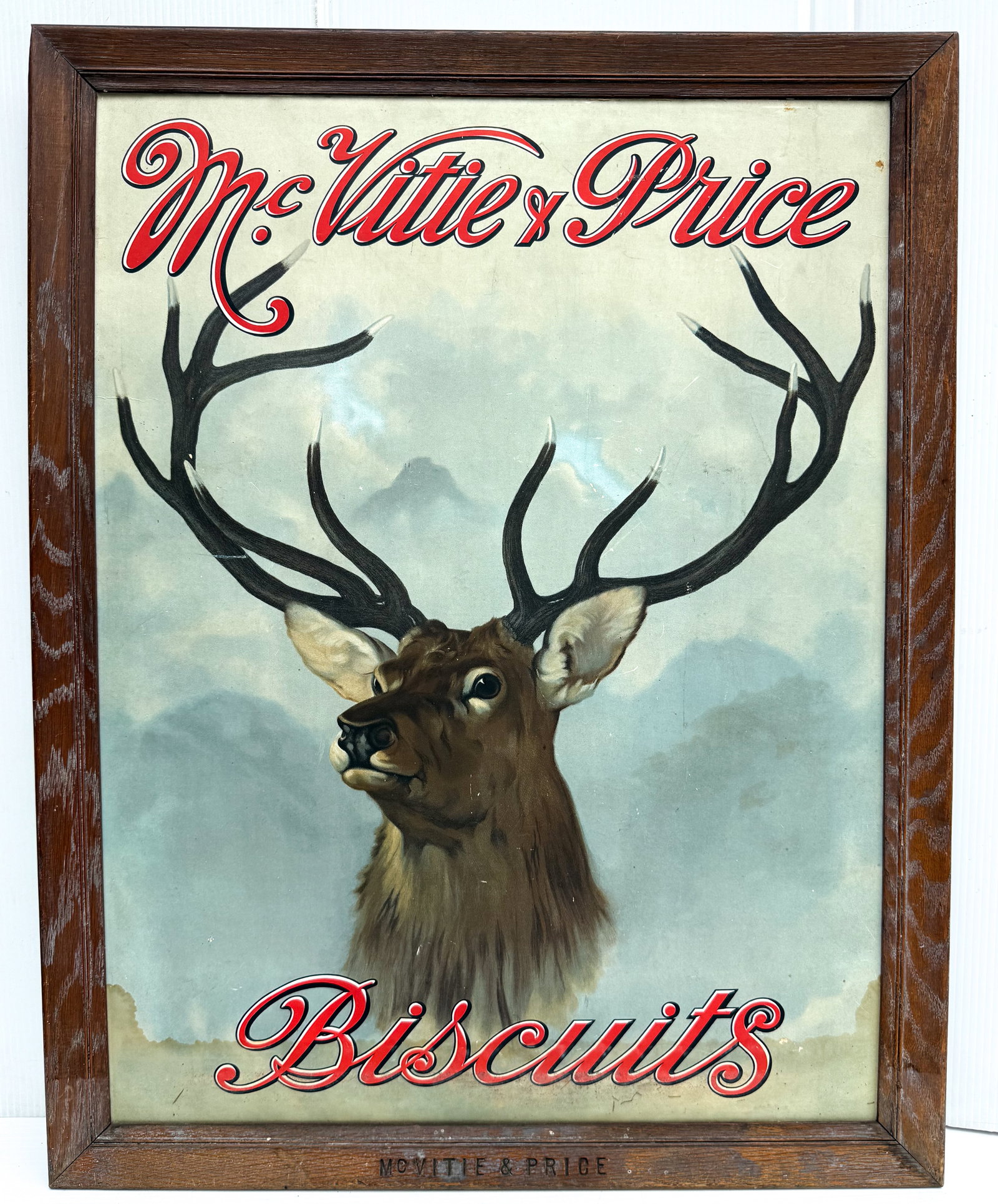 MCVITIE & PRICE BISCUITS ADVERTISING SIGN: PAPER LITHO IN MRKD. WOODEN FRAME. TOTAL SIZE 34 1/2" X 27". PLEASE READ CAREFULLY - THIS IS AN ONLINE ONSITE ONLY AUCTION - Terms for Purchasing and Shipping of Auction Items. Please read carefully b