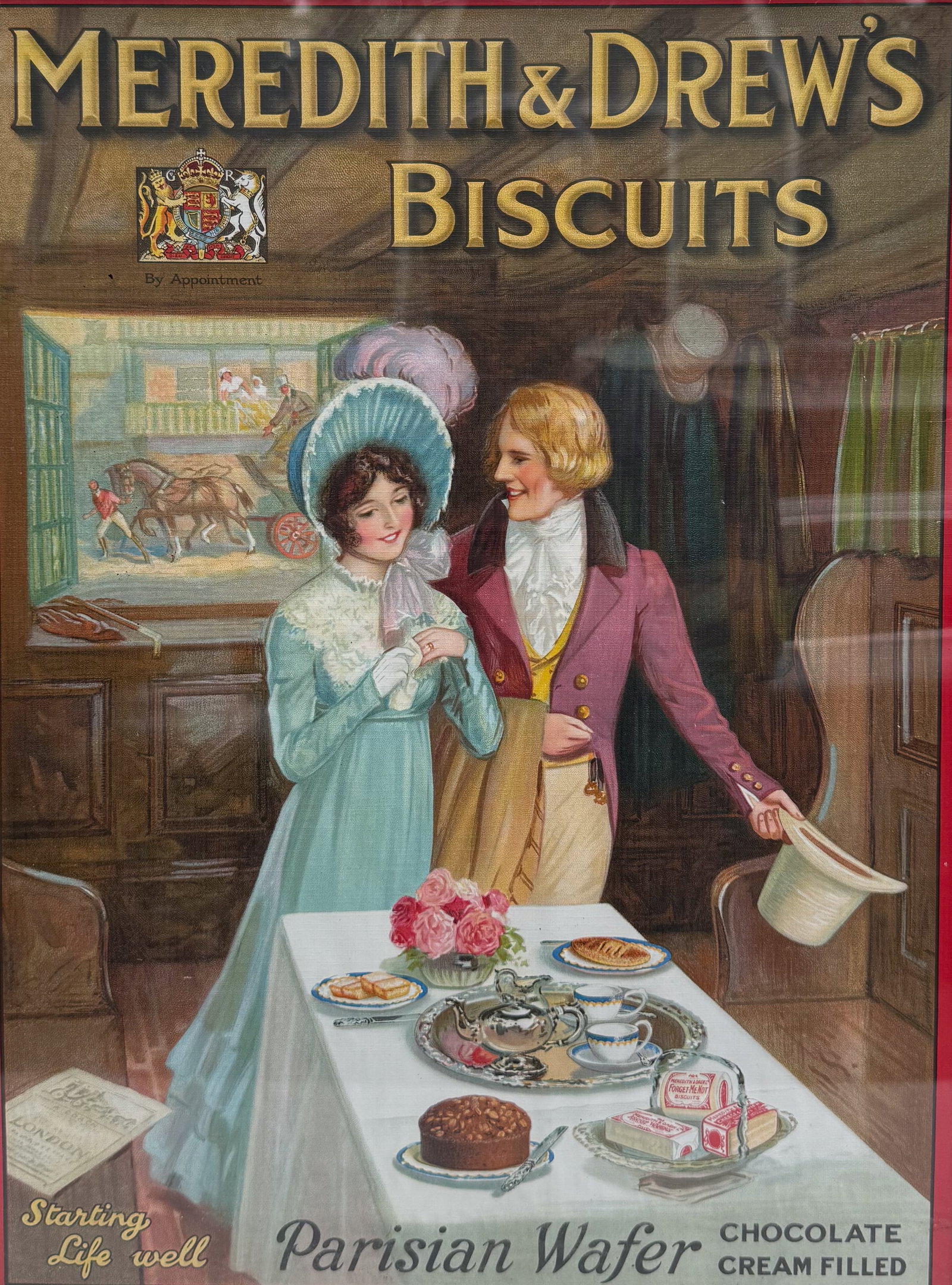 MEREDITH & DREW'S BISCUITS ADVERTISING SIGN: PAPER LITHO "STARTING LIFE WELL, PARISIAN WAFER CHOCOLATE CREAM FILLED" FRAMED UNDER GLASS. 23 1/2" X 18 1/2". PLEASE READ CAREFULLY - THIS IS AN ONLINE ONSITE ONLY AUCTION - Terms for Purchasing and 