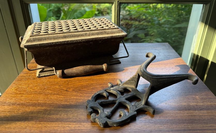 CAST IRON BOOTJACK AND FOOTWARMER (1 of 3)