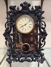 CAST IRON FRONT MANTLE CLOCK