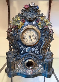 WATERBURY CLOCK CO. CAST IRON FRONT MANTLE CLOCK