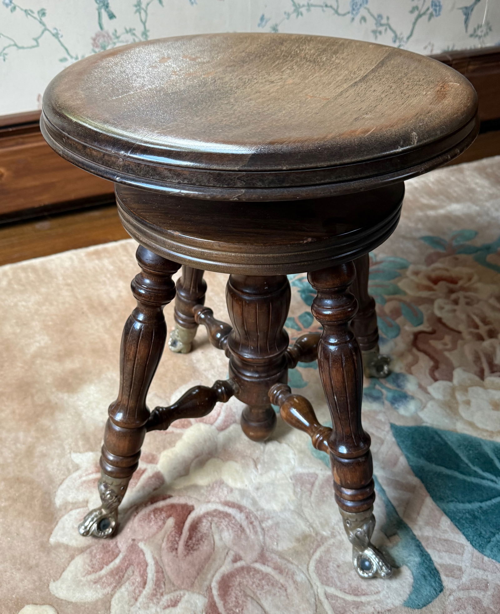 WOODEN PIANO STOOL: ADJUSTABLE HEIGHT. METAL FEET WITH CRYSTAL BALLS. 18 1/2" X 15" PLEASE READ CAREFULLY - THIS IS AN ONLINE ONSITE ONLY AUCTION - Terms for Purchasing and Shipping of Auction Items. Please read carefull