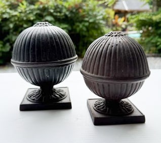 (2) CAST IRON STRING HOLDERS